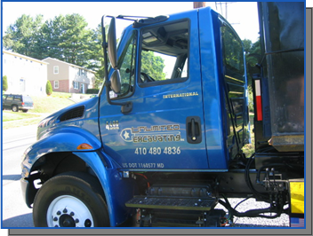 Our roll off dumpster truck in Baltimore, MD - Unlimited Excavating, Inc.